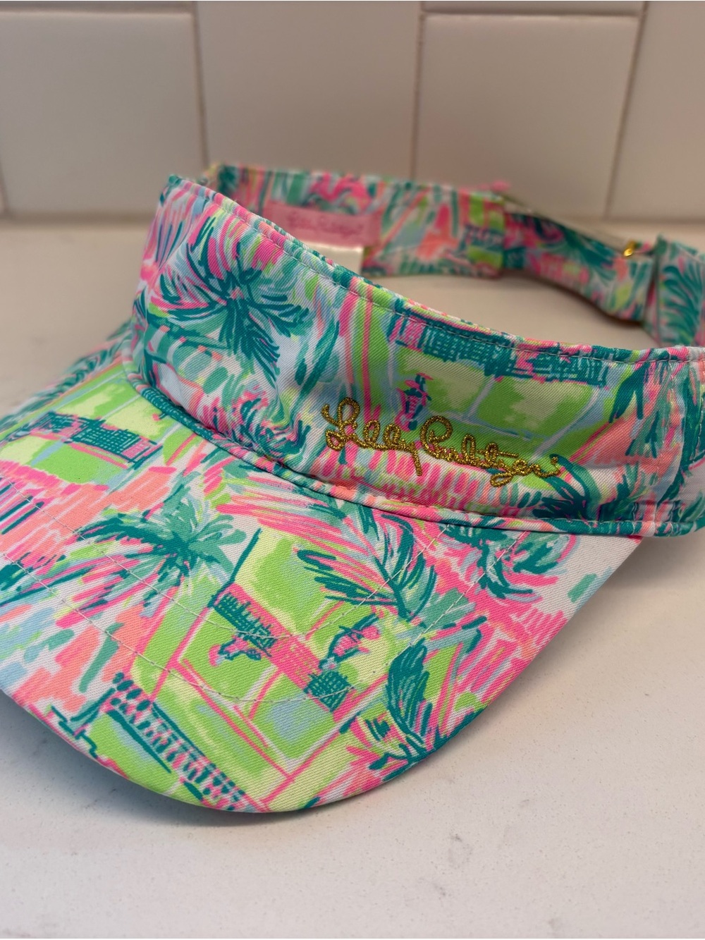 Lilly Pulitzer Gold Script Logo Palm-Print Visor in Pink, Green & Teal